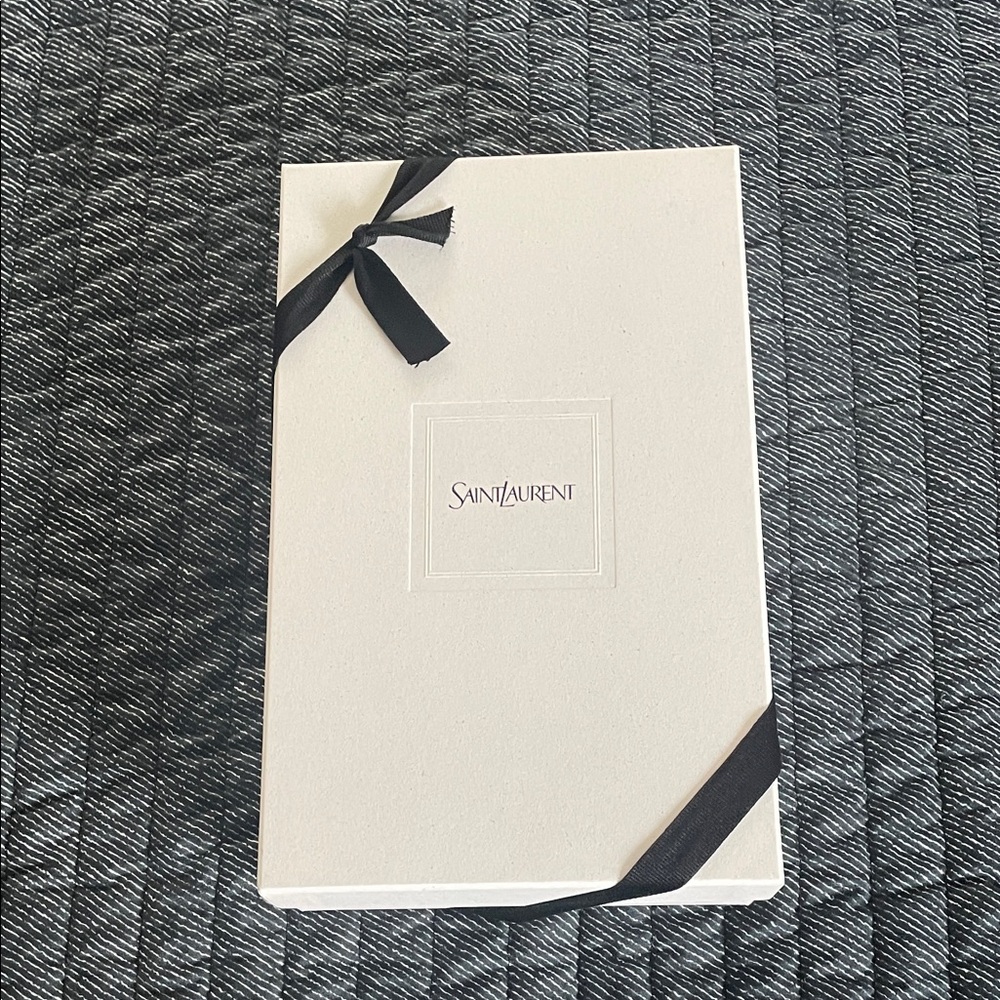 Saint Laurent
Cassandre Envelope Chain Wallet in Lambskin - Picture 12 of 12
